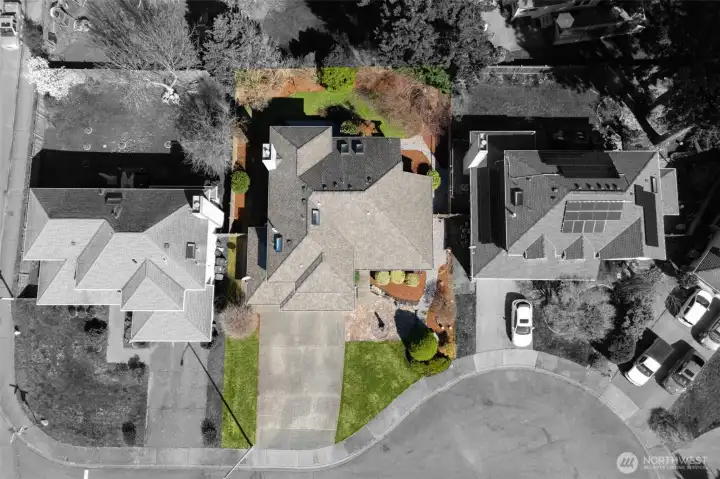 Aerial view of home and cul-de-sac.