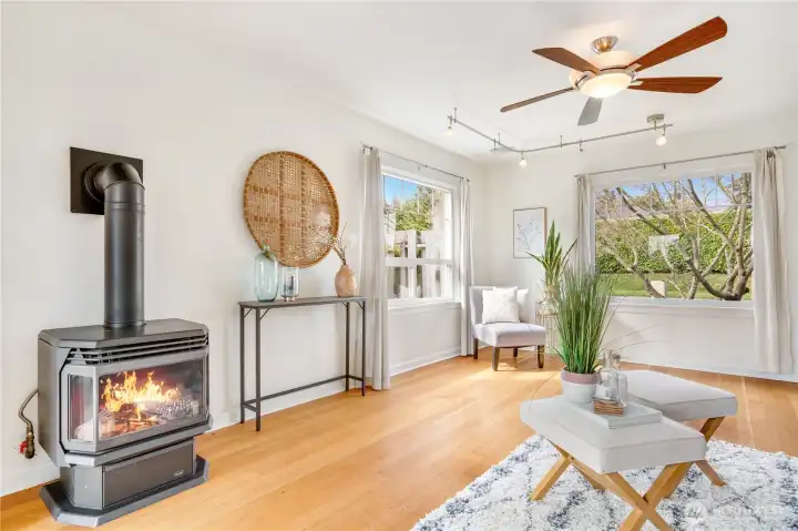 A gas stove anchors the room, adding character and providing efficient heat—ideal for cooler evenings.