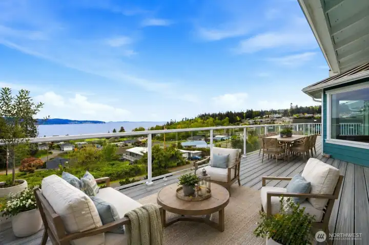 VIRTUALLY STAGED: Main floor expansive, entertaining deck VIRTUALLY STAGED: Main floor expansive, entertaining deck
