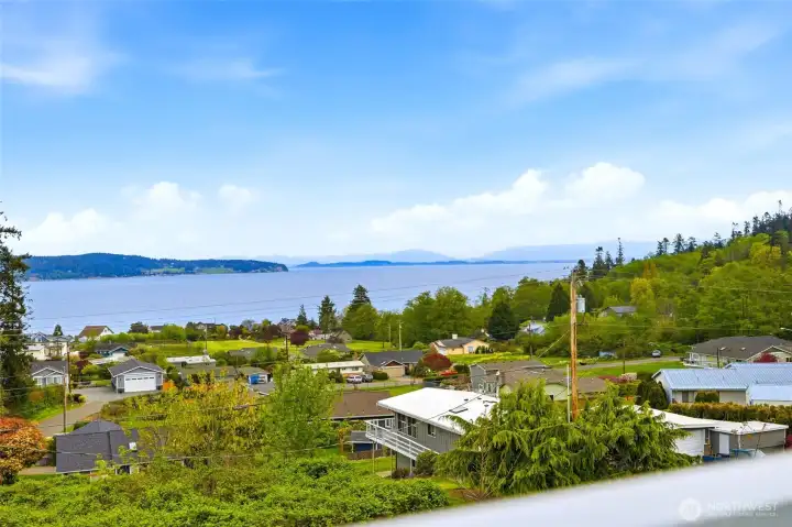 Expansive gorgeous view of Skagit Bay, Mt. Baker and overlooking Oak Harbor to the west