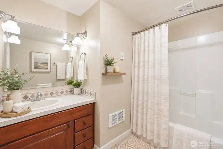 VIRTUALLY STAGED media room / studio bathroom VIRTUALLY STAGED media room / studio bathroom