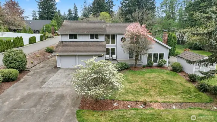 Enjoy a 2 car garage, shed, and 1800 sqft shop - so many storage options!