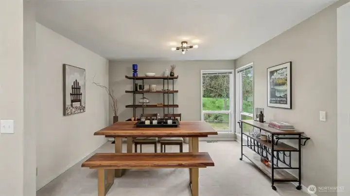 The formal dining area is tucked next to the kitchen for ease of serving.