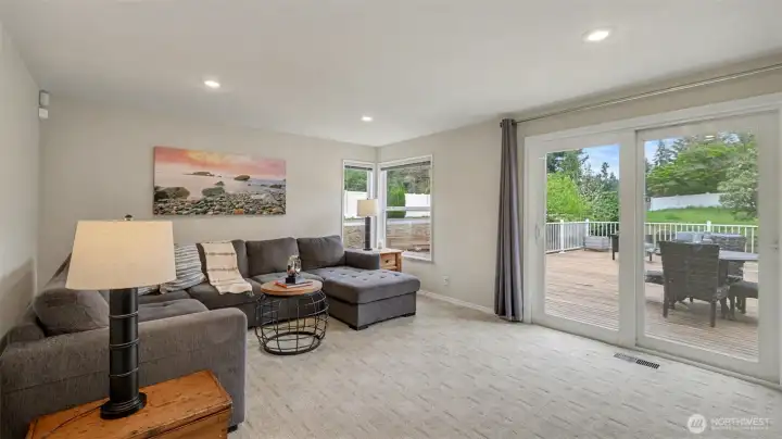 Comfortable family room with sliding doors leading to the newer deck.
