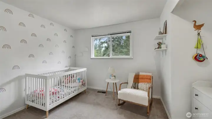 Another generously sized secondary bedroom.
