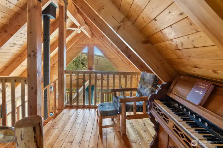 Spacious loft enough for sitting area and more.