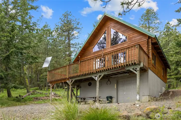 Large basement offers shop & storage space.