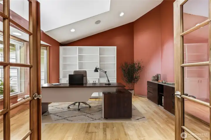 A virtually staged representation of what the main level office could look like furnished.
