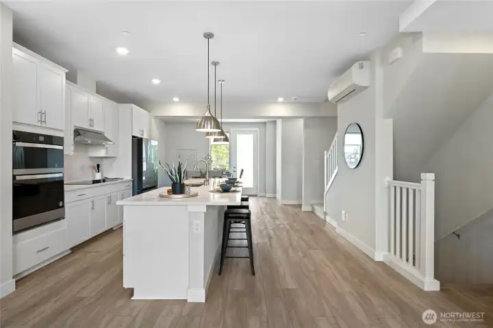 Open kitchen and dining area with functional lay out. Open kitchen and dining area with functional lay out.