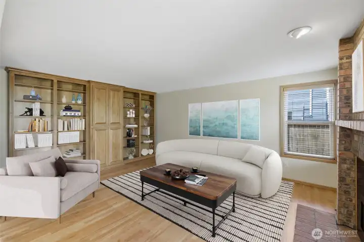 Another view of the main floor den with custom made bookshelf. virtually staged