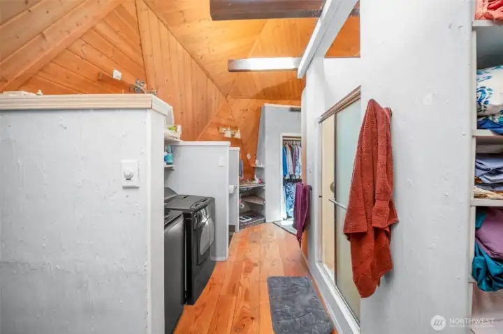 Laundry in the middle for convenient washing! Spacious walk in tiled floor shower. Laundry in the middle for convenient washing! Spacious walk in tiled floor shower.