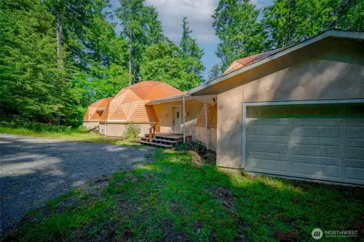Two car garage and toilet and shower in first dome. Two car garage and toilet and shower in first dome.