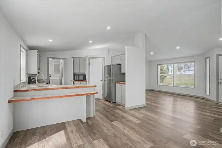Dining room looking at kitchen and living room Dining room looking at kitchen and living room