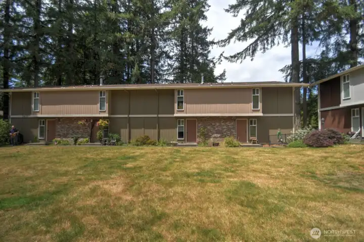Front of complex, home is third door from the left. #6