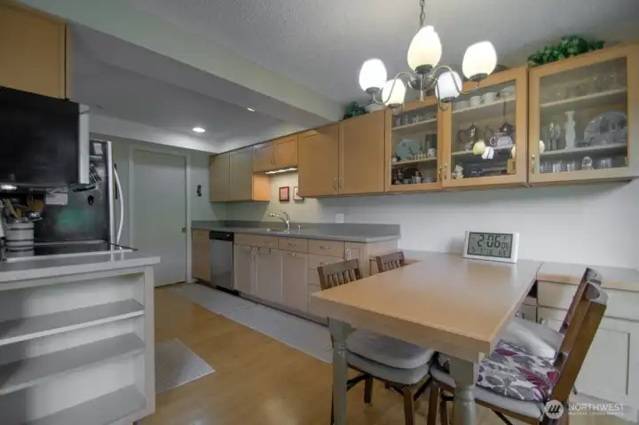 built in dining table complements this dining space