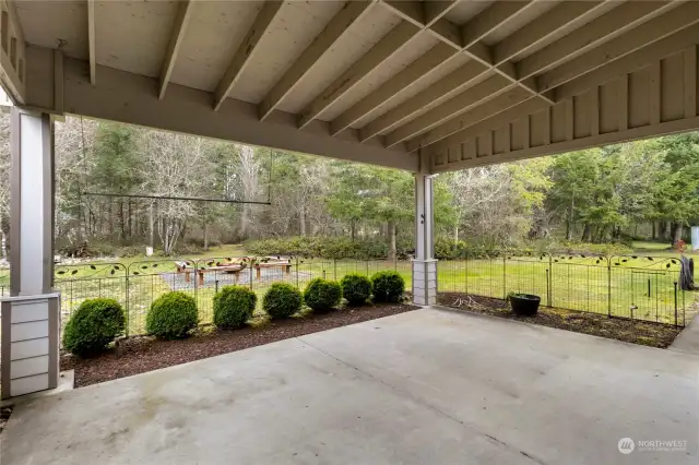 Huge covered concrete patio great for entertaining or just relaxing in your own Oasis.