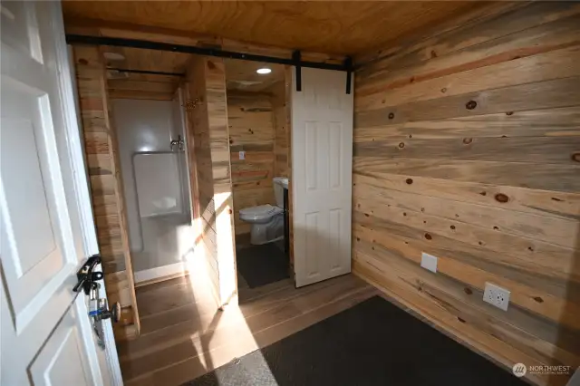 The "WASHHOUSE" ~ boasting separate shower w/infrared heater, on demand hot water, laundry and room for sauna.