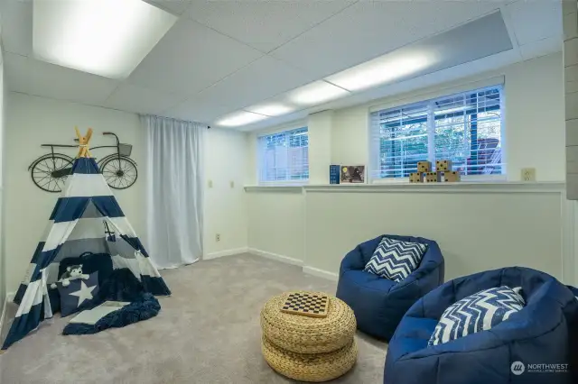 2nd living room. Plumbing beneath the window to potentially add a kitchen