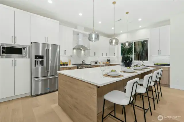 2 Tone cabinetry with extra large island and quartz countertops