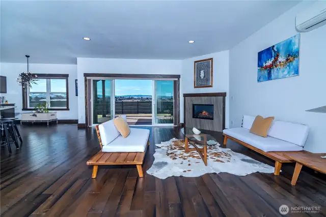 The living room flows seamlessly into the kitchen and breakfast nook, creating the perfect space for entertaining and family activities.