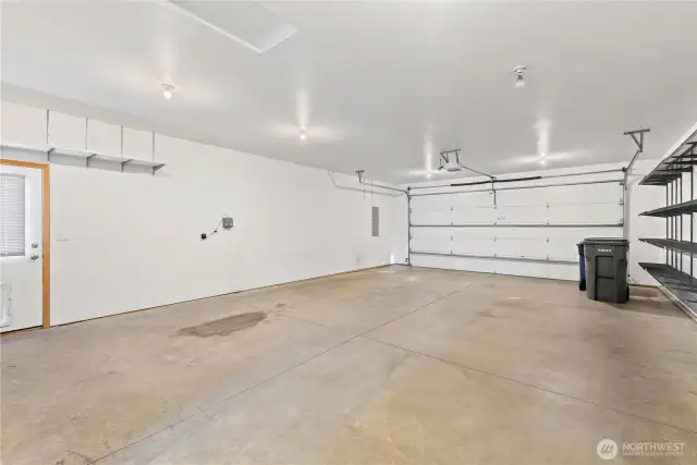 HUGE garage!  Lots of built in shelving.  Room for toys, workshop, etc.