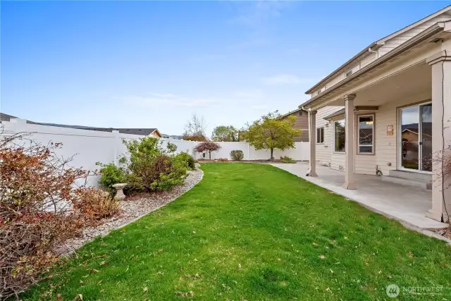 Fully fenced yard.  Mature landscaping.