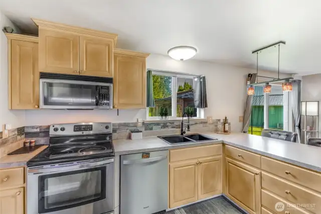 Enjoy the mountain view while doing the dishes.