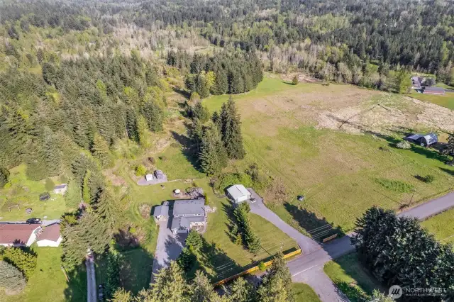 A wooded area at the back of the property allows camping and adventure without going anywhere.