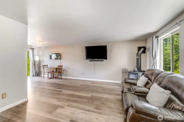 Just inside the entry is a great space to lounge or entertain. How would you decorate it?