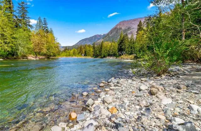 River has a nice sandy beach located to the right when you exit the trail