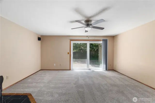 Sliding door to rear patio and yard. Open it up in the summer for indoor/outdoor entertaining