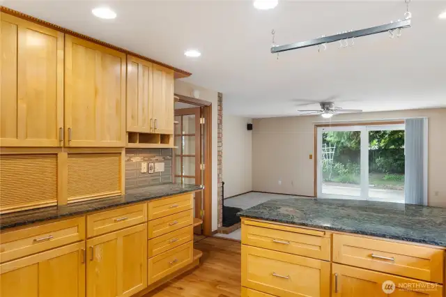 Loads of countertop and cabinet space, with wonderful appliance garages to hide away cooking tools for a neat appearance