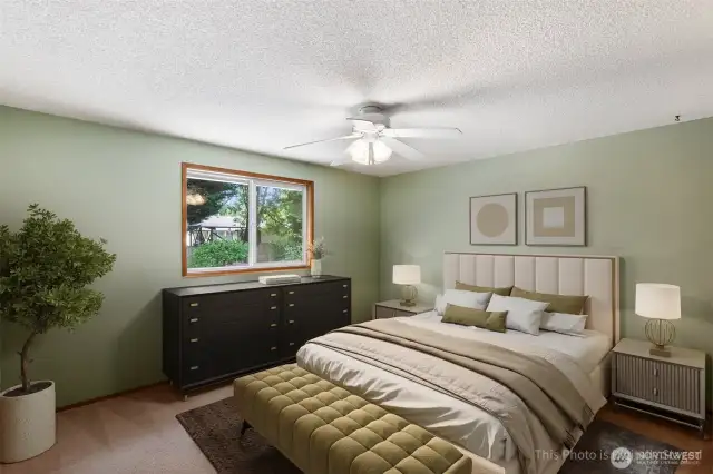 Primary suite is virtually staged here to show some furniture options. May not be to scale.