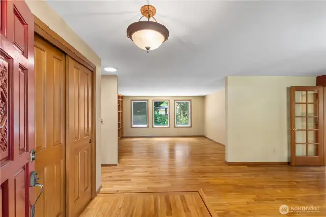 Come on in! You are greeted with open spaces and warm hardwood floors, with inlay detail.