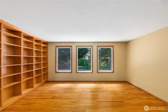 Library/den/living room shown empty-the way you will view it when you visit