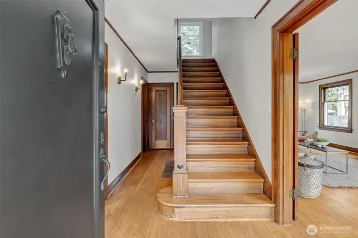 Unpainted millwork and period details invite you in