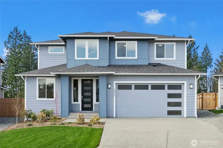 2 Car Garage + Shop Space.