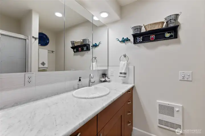 3/4 bath right outside the kitchen sitting area