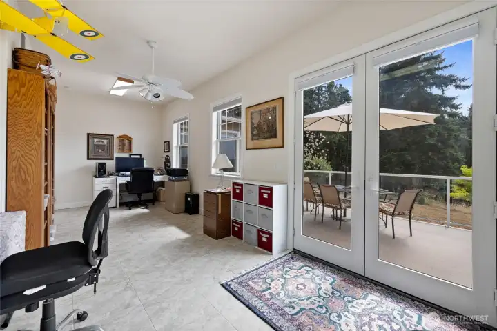 The office has French doors leading to the deck