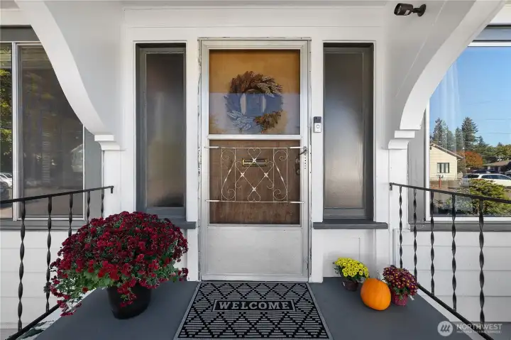Charming covered front porch, perfect for season decorating.