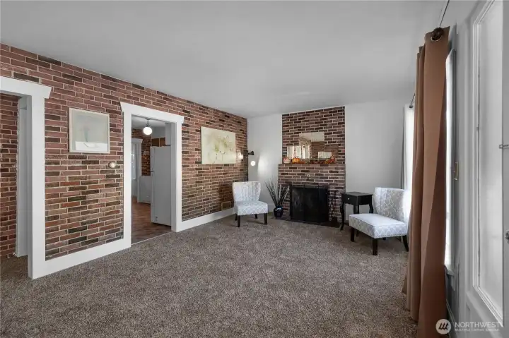 Welcome in to the living room complete with new carpet and fresh interior paint