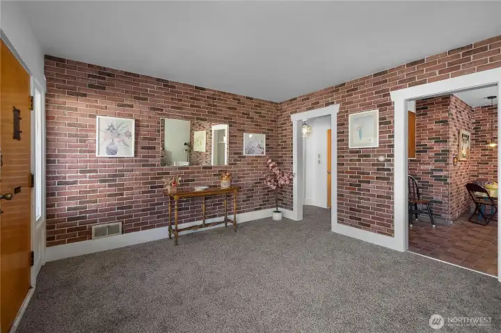 Living room, with vintage door complete with mail slot!