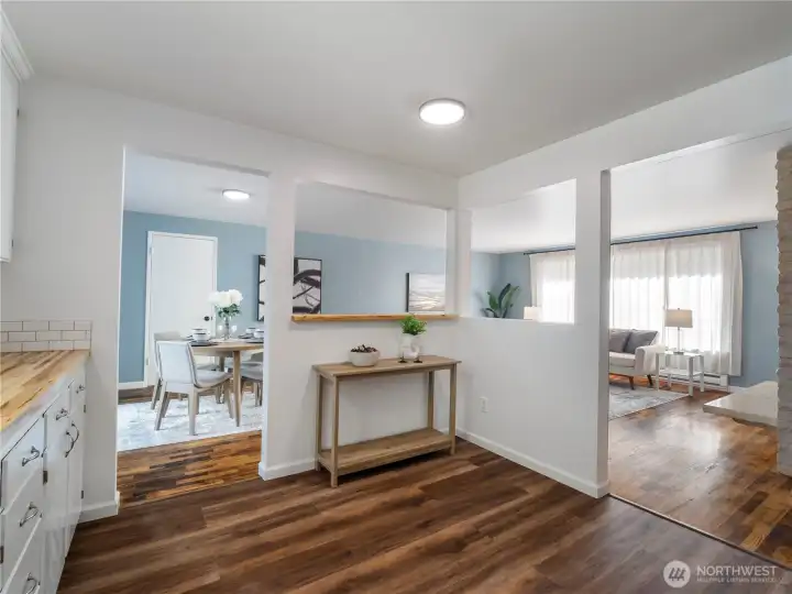 Kitchen view into living and dining space