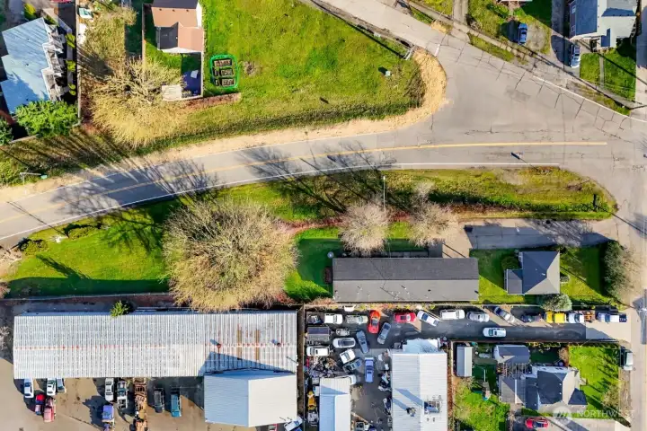 No Flood Zone!!  Looking down on Portal Way and Eaton, Eaton Ave is seen to your right.  Long 16,117 sqft lot - ripe for new opportunities.  Stormwater at the junction of Cedar/Eaton/Portal.