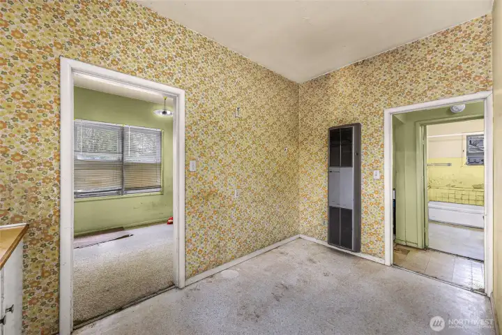 Small house - Kitchen with eating space, dining area to your left, hallway and bathroom to the right