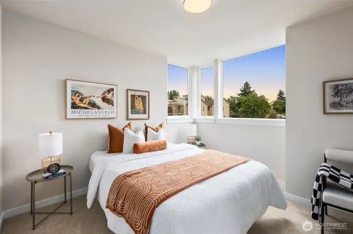 Guest bedroom on the upper level.  This photo is of the previous staged Avenue Plan which we no longer have any left of those.  The last 2 available homes are our Courtyard Plan which also has an upper floor guest suite like this but includes an ensuite bathroom for guests.