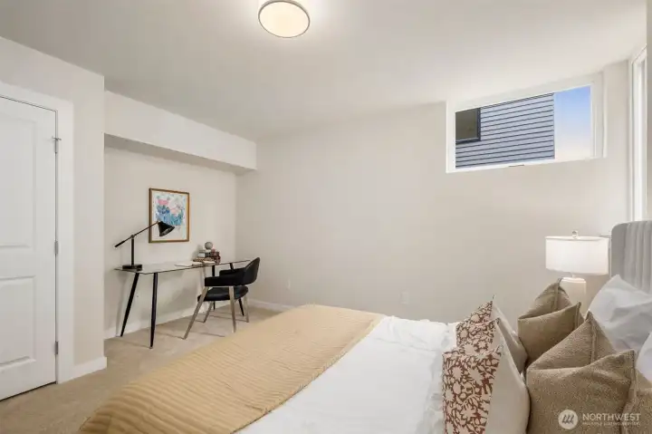 Guest bedroom on the main entry.  This room is very large with a double entry closet and next to a 3/4 bathroom.  It is perfect for longer staying guests or roommates or an in-home office.