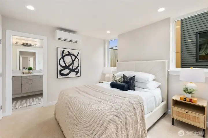 Primary bedroom complete with ensuite bathroom.  This is a photo of a previous Avenue plan (sold out), but the Courtyard plan's bedroom is just as spacious and private.