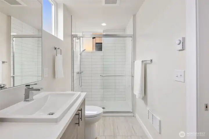 Previous Avenue Plan Model Home bathroom (Avenue Plan is sold out).  The Courtyard Plan's primary bathroom is just as light and spacious.