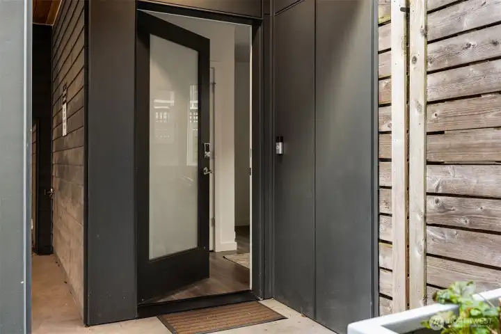 The front door opens to a combo of 'modern mudroom' and dedicated office.